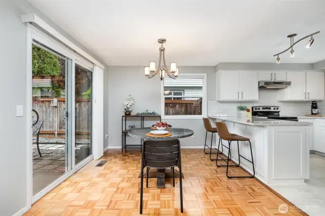 Dining area off the kitchen and slider to backyard