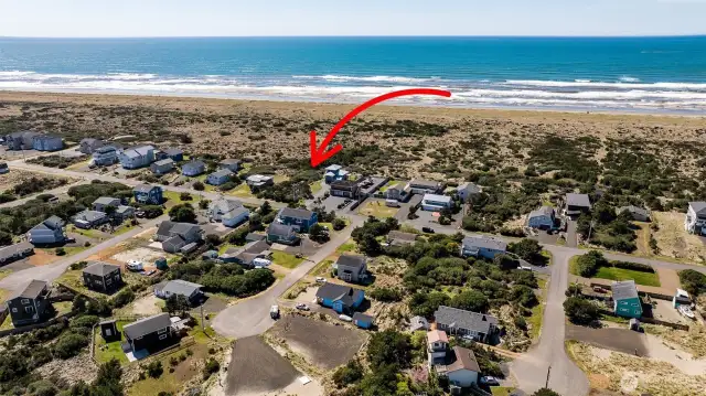 Arrow indicates estimated location of lot for sale