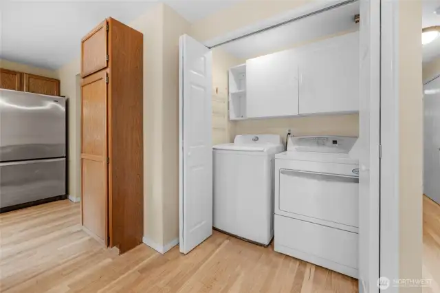 Washer/dryer in a handy closet.