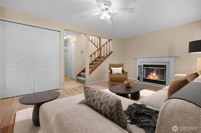 Relax by the fire in this peaceful sitting area - virtually staged.