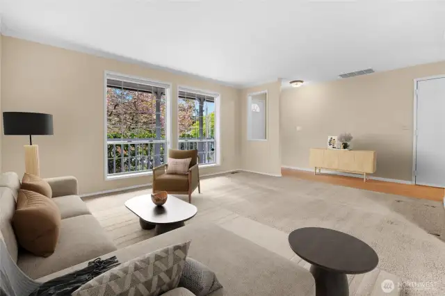 Or turn to the right into the spacious living and more formal dining room spaces - virtually staged.