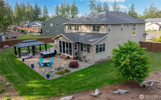 This expansive backyard unfolds like a private oasis!