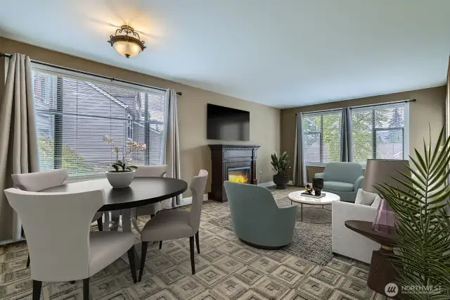 Pretty textured carpet, designer window coverings and the beautiful mantle for the electric fireplace create a lovely place to call home. Virtually staged.