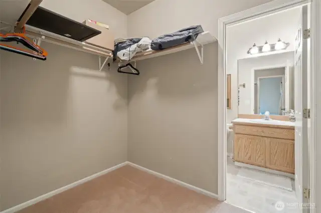 Second ensuite walk in closet. Both primary and ensuite are on opposite ends of the home for privacy.