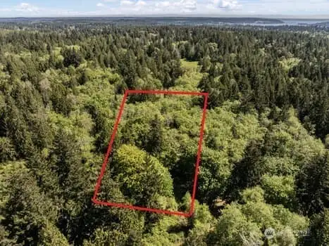 Gorgeous, expansive 1.8 acre lot with power and a shared well! Build your home today!
