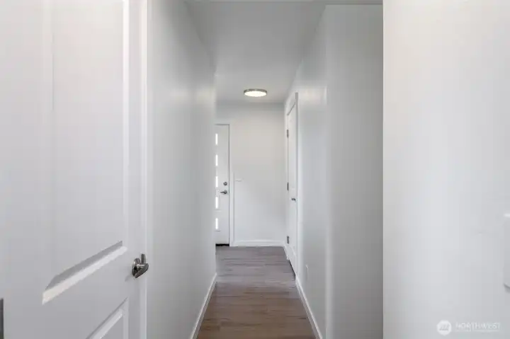 Hallway to front with Brand new LVP Floors