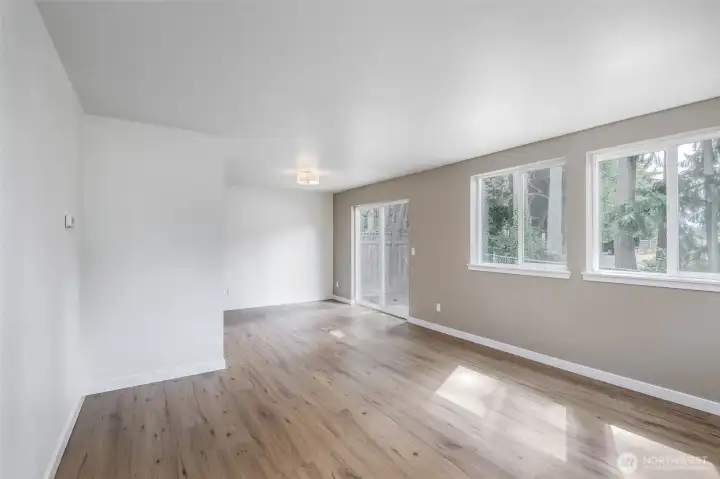 Living room that leads to back yard sliding glass door