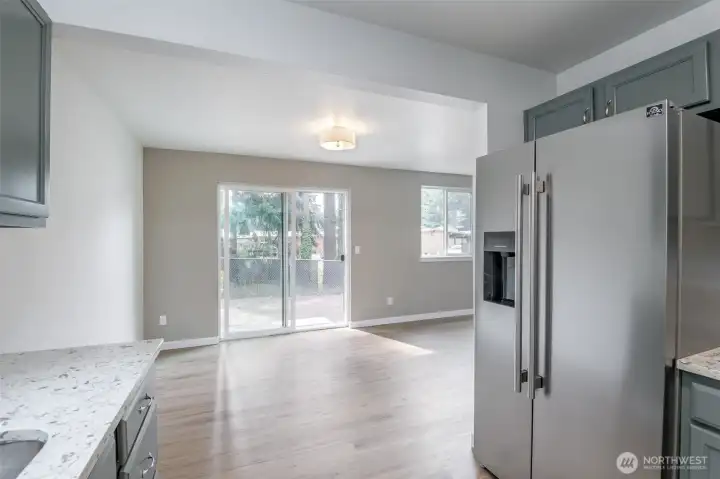 Brand new refrigerator with LVP floors