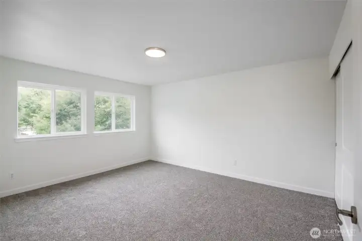 Primary Bedroom with Brand new carpeting
