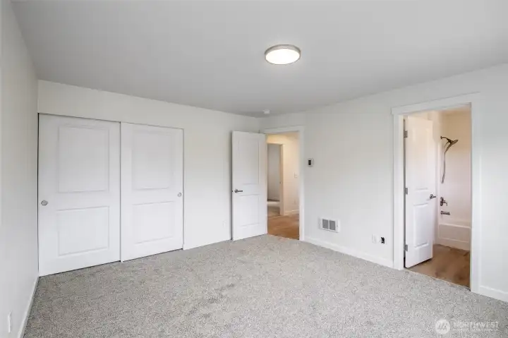 Large Primary Bedroom with Brand new carpets