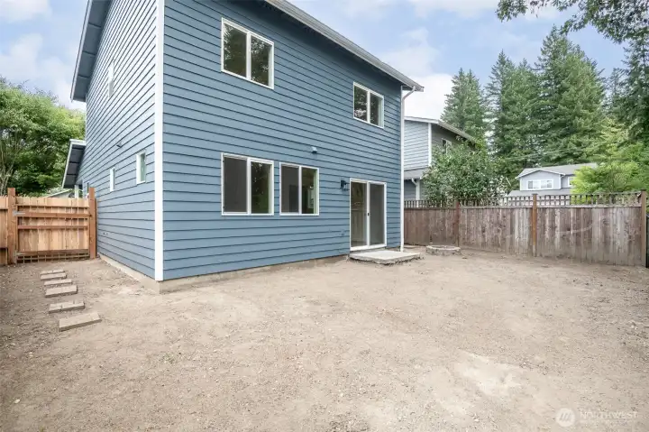 Back of home with level yard. Brand new exterior paint