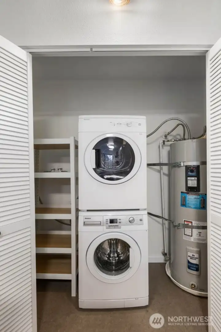 Storage, washer, dryer, and water heater all neatly tucked away.
