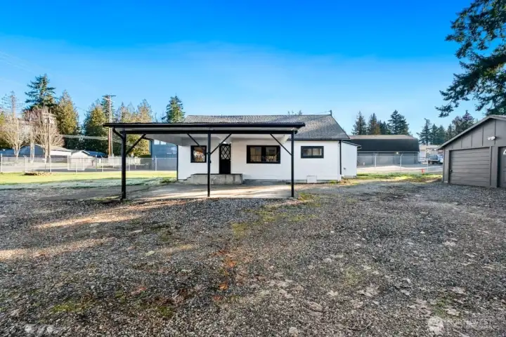Carport parking or covered outdoor living space.