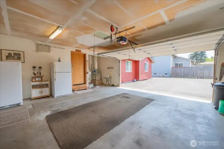 True 2-car garage with utility space.