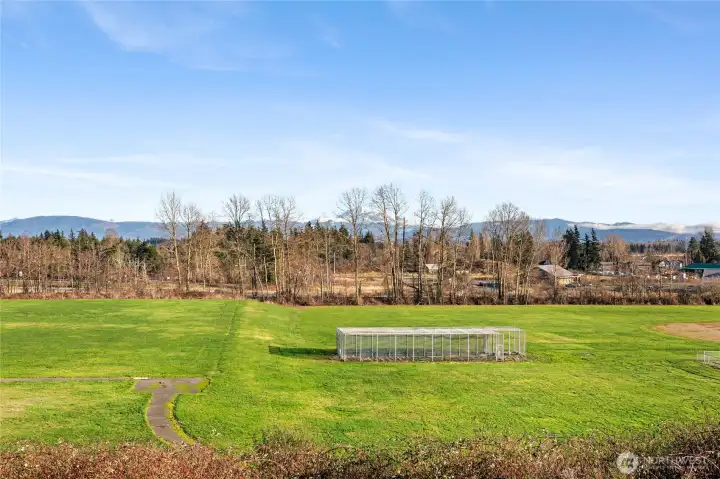 Trail to school district fields right from your yard
