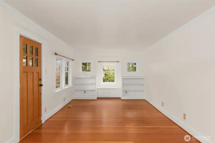 This room faces east and has lovely light and period windows.