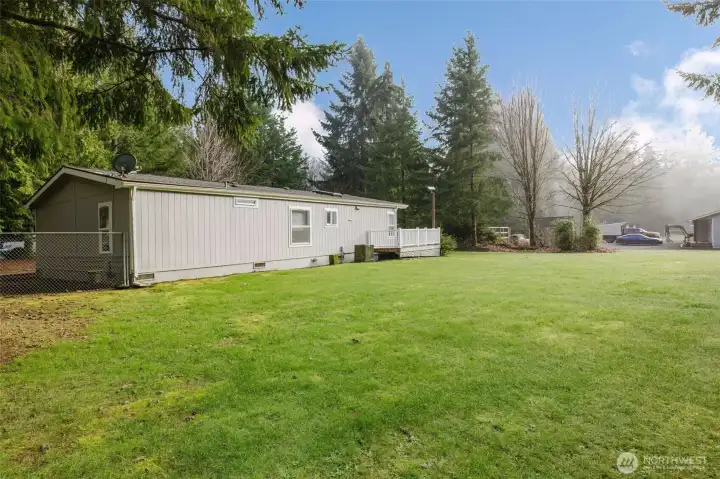 Large backyard between the home and the pasture.