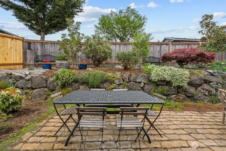 Al fresco dining at its finest — the patio is the perfect extension of the indoor living spaces.