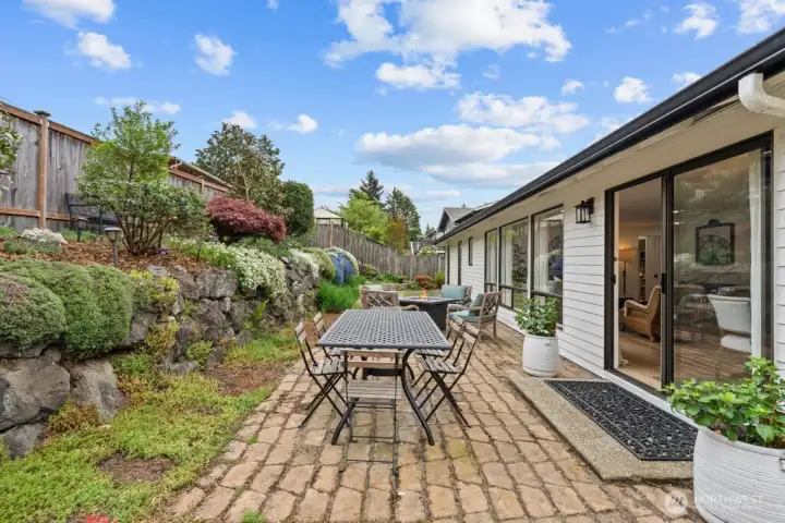 From the dining patio to the firepit to the terraced gardens — every inch of this yard was designed with intention.