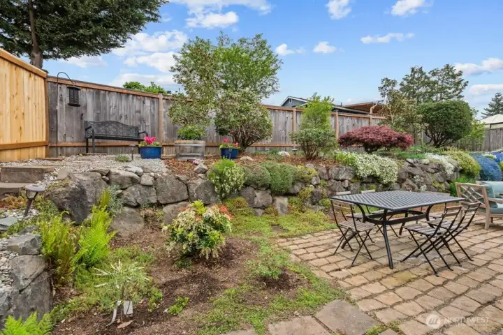 Take the path up. The upper garden and its hummingbirds await.