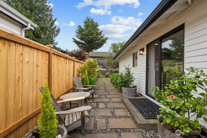 The kind of morning coffee spot you didn't know you needed — tucked among the hydrangeas, just off the kitchen.