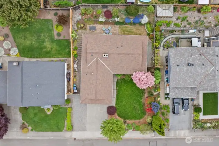 A bird's eye view of the lush, professionally landscaped grounds — even more stunning from above.