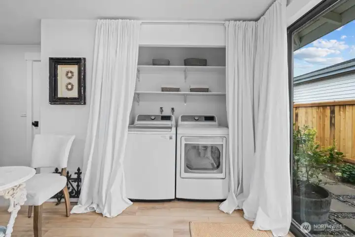 Updated washer and dryer included — conveniently located and thoughtfully tucked away.