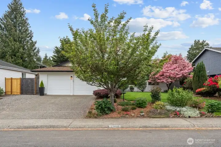 The entry and oversized garage, thoughtfully maintained and move-in ready from the moment you pull up.