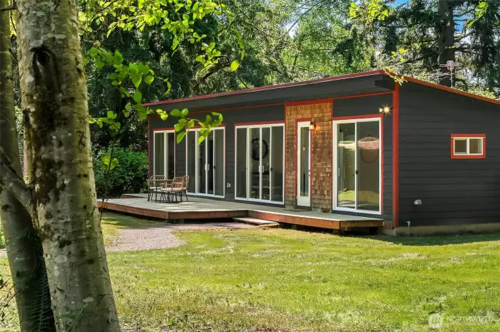 The home features a metal roof, hardi-plank siding, a 3-bedroom septic, and 3+ acres.