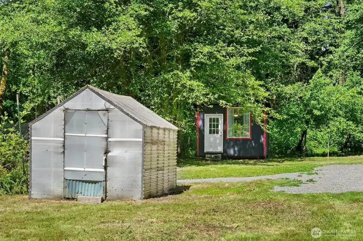 Situated on the west side of the property is one of two finished studios. A great WFH option!
