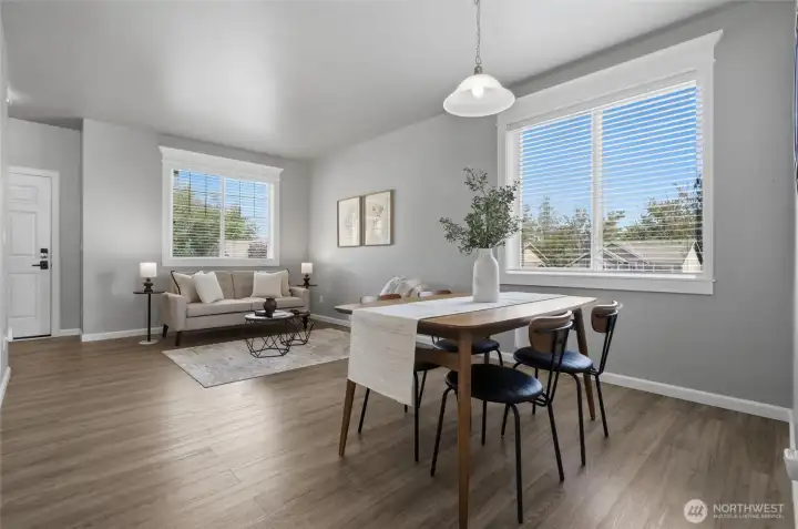 Entry to the living room includes a full coat closet and access to the crawl space.