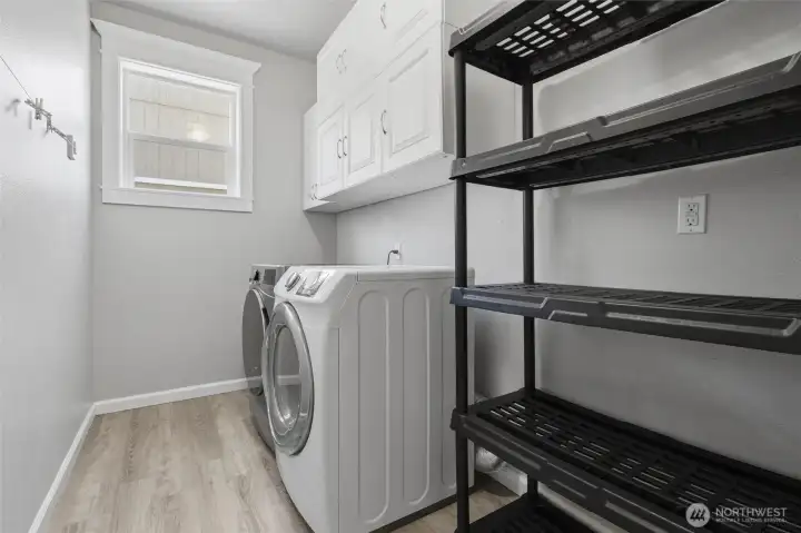The washer, dryer and storage racks will remain in the home if the buyer desires.