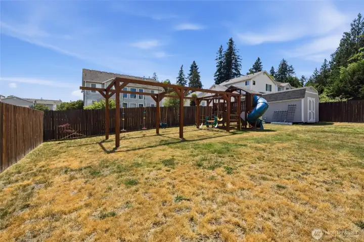 The back yard has a play structure in great condition.