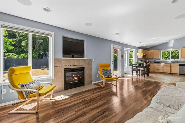 Open Concept Living Room with Lots of Natural Light and Gas Fireplace Open Concept Living Room with Lots of Natural Light and Gas Fireplace