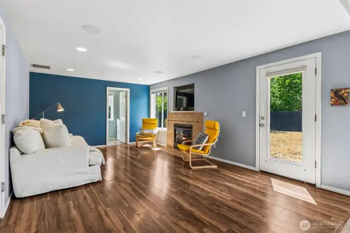 Open Concept Living Room with Lots of Natural Light and Gas Fireplace Open Concept Living Room with Lots of Natural Light and Gas Fireplace