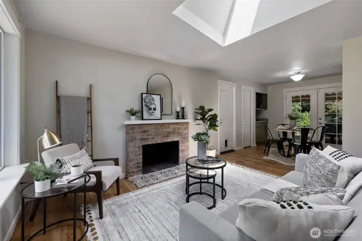 Living room opening up to dining room