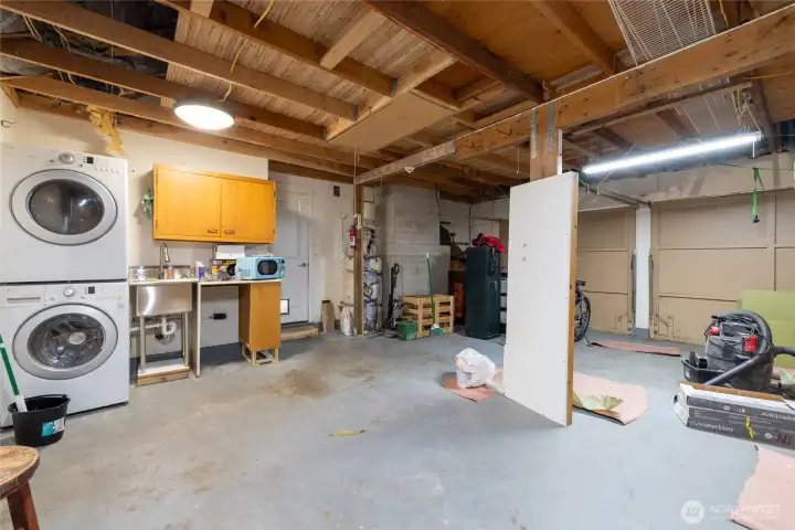 Spacious 2 car garage and room for hobby work or storage
