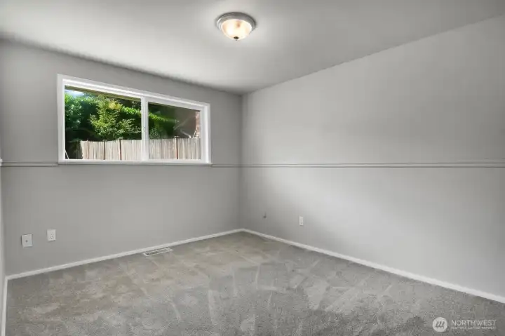 2nd bedroom with new paint and carpet, trim and doors 2nd bedroom with new paint and carpet, trim and doors