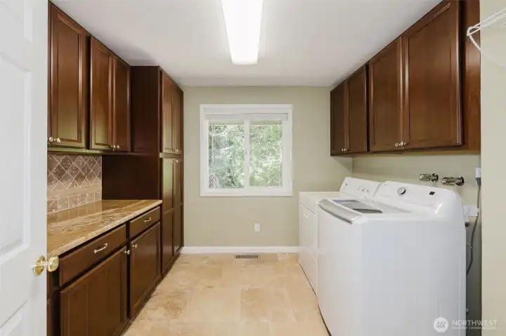 Main floor washer and dryer. Look at those cabinets! Main floor washer and dryer. Look at those cabinets!