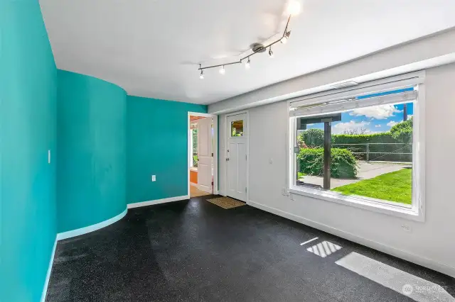 Family room on the lower level with access to rear yard.