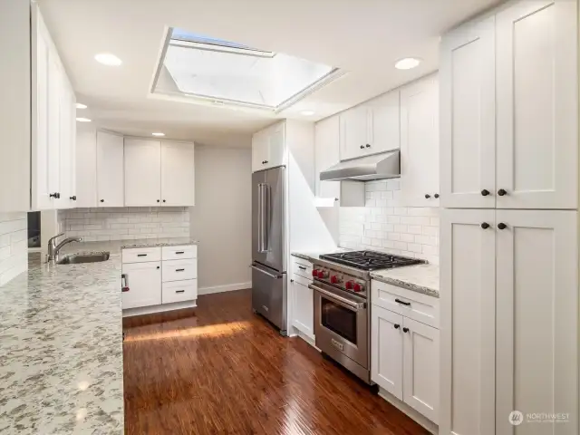 Stainless appliances, plenty of cabinets and storage here.