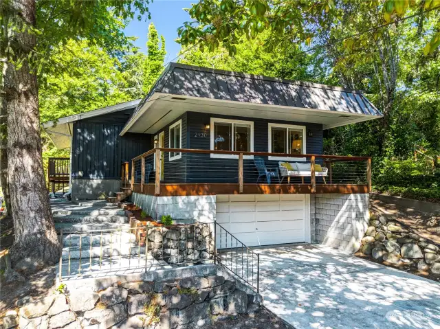 This updated 1940s home with a brand new roof is set in the peace of the trees near the town life of Manette and within easy distance of the Bremerton-Seattle ferry.