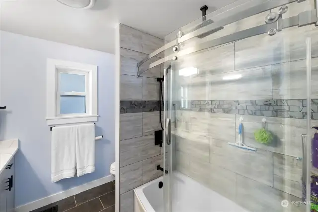 Bathroom on Main with a Rain Showerhead.