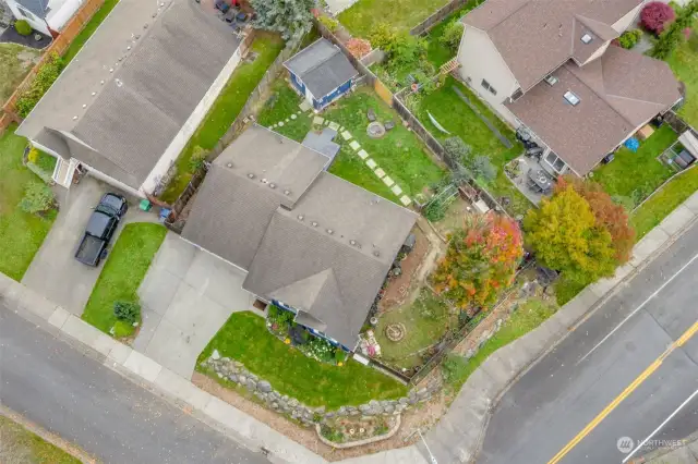 quite a bit of yard in back & side, fully fenced with multiple areas to use for play & gardening