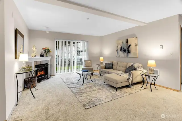 Living Room with Fireplace and Patio