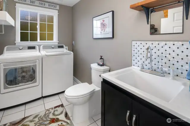 Large laundry room with guest bath