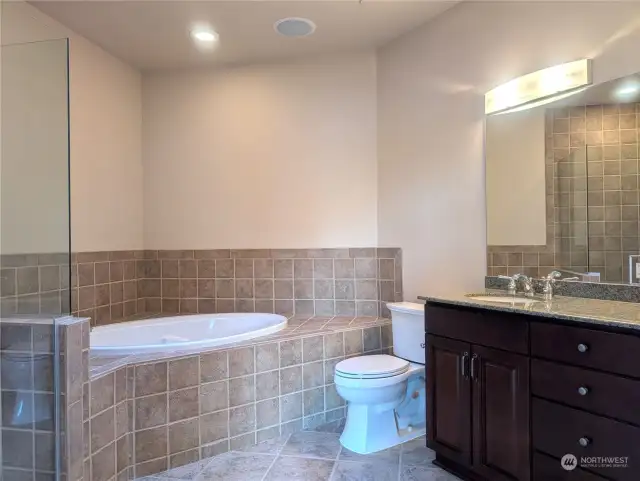 Generous full sized master bath with ceiling speaker for your relaxation