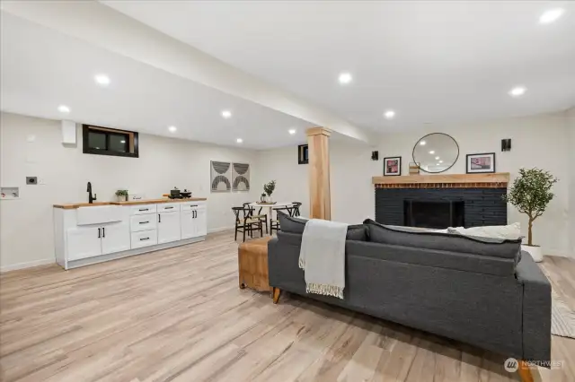 Once downstairs, you'll find a kitchenette with space for stackable washer/ dryer and oven.