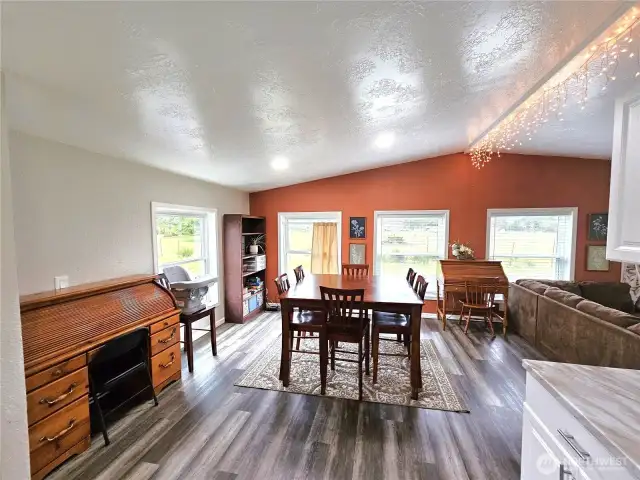Dining. Living area is all laminate flooring.