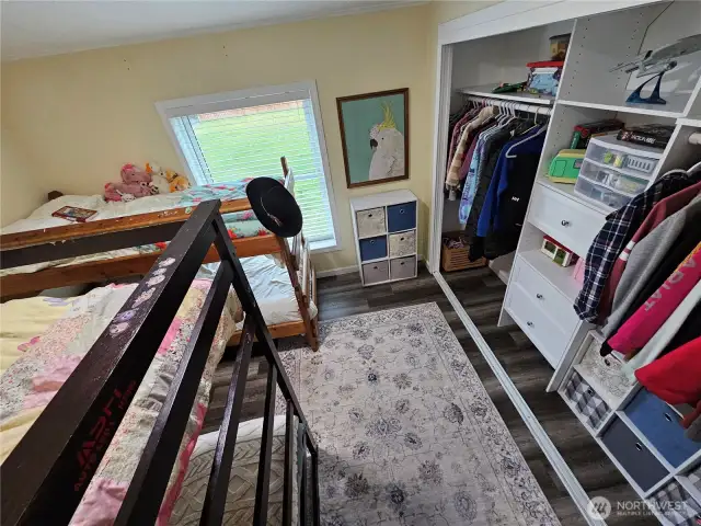 Closet organizer in bedroom
